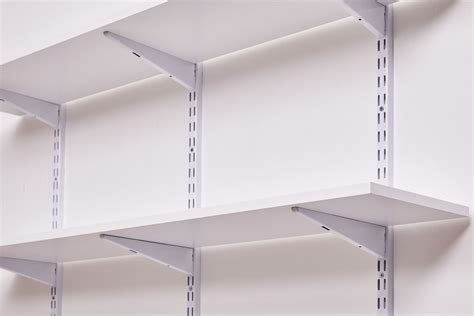 brackets for shelf slits inside metal locker|How to Install Shelving Brackets .